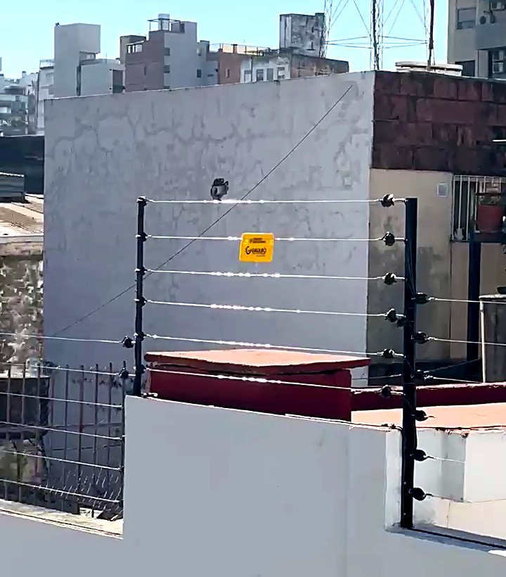 Cerco eléctrico instalado en terraza en altura